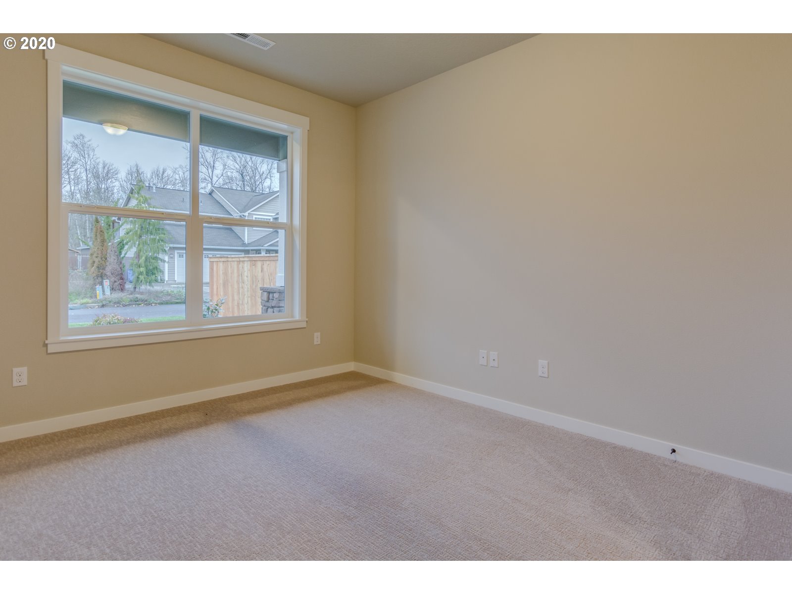 8524 North 1st Street, Unit LT96 Ridgefield, WA 98642 - Photo 5 of 32 a view of an empty room with a window