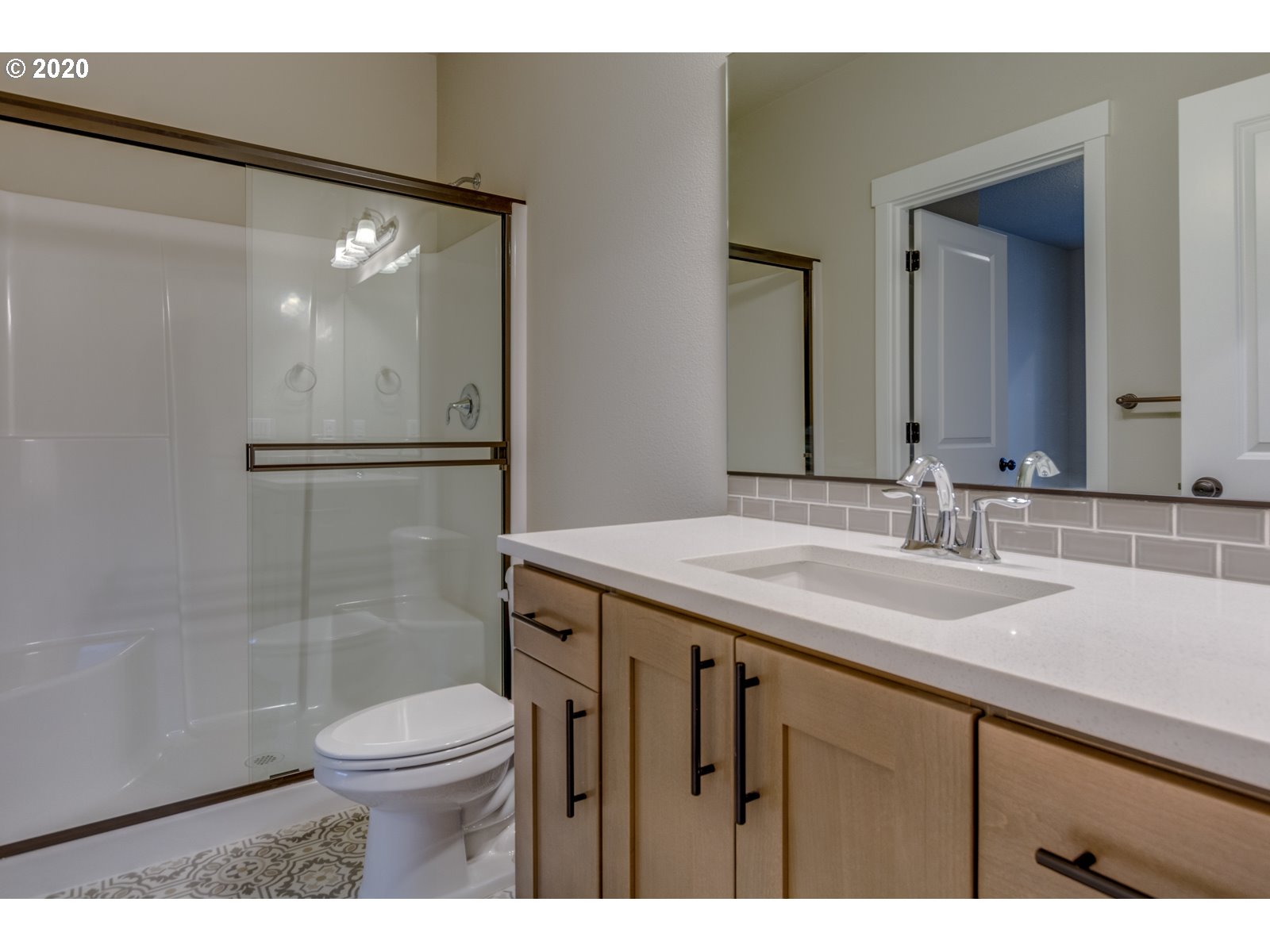 8524 North 1st Street, Unit LT96 Ridgefield, WA 98642 - Photo 8 of 32 a bathroom with a granite countertop sink toilet and shower