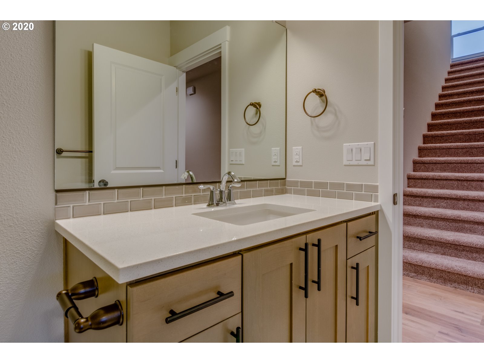 8524 North 1st Street, Unit LT96 Ridgefield, WA 98642 - Photo 9 of 32 a bathroom with a sink and a mirror