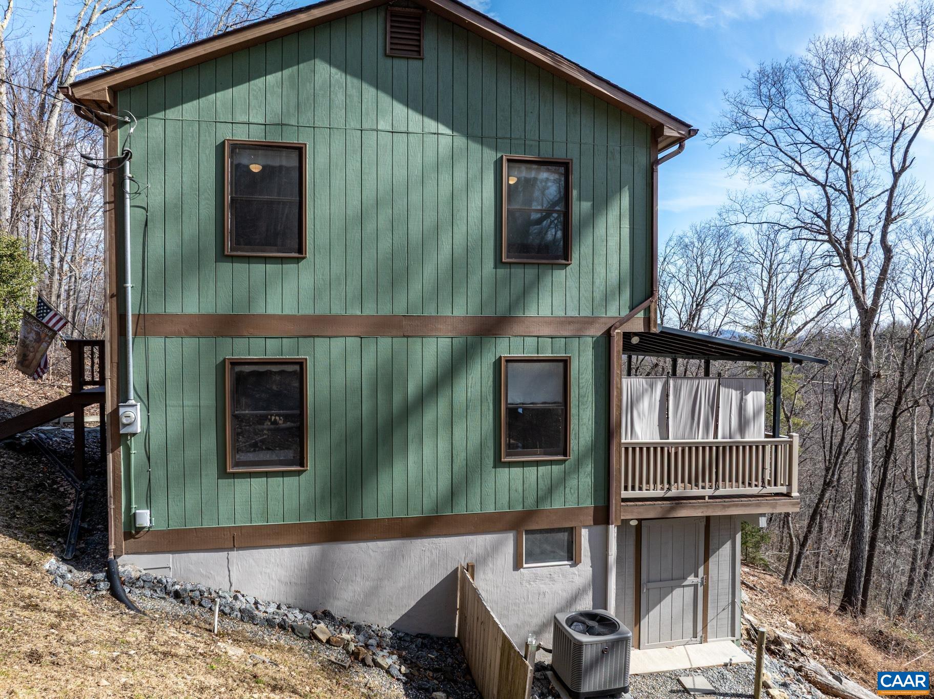 1022 Turkey Ridge Road Stanardsville, VA 22973 - Photo 19 of 74 a front view of a house with balcony