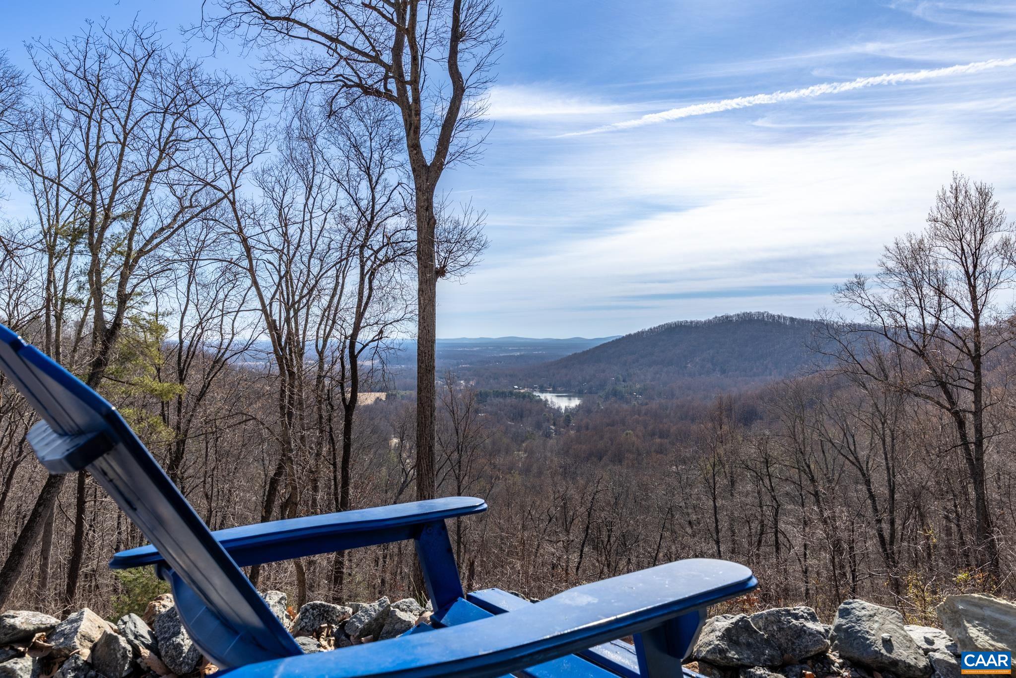 1022 Turkey Ridge Road Stanardsville, VA 22973 - Photo 2 of 74 a view of a balcony with a yard