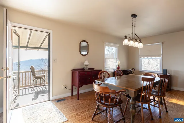 a kitchen with stainless steel appliances granite countertop a stove sink and cabinets