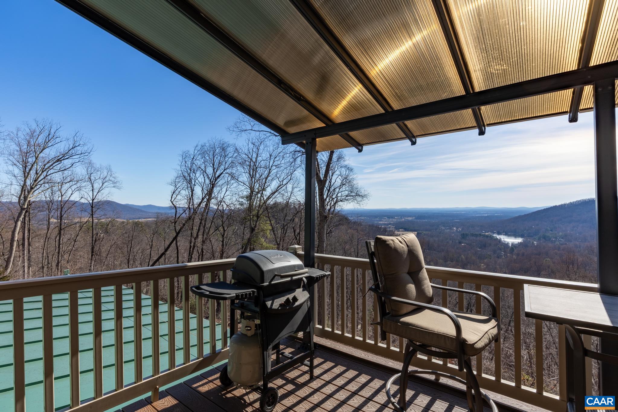 1022 Turkey Ridge Road Stanardsville, VA 22973 - Photo 45 of 74 a view of a balcony with furniture