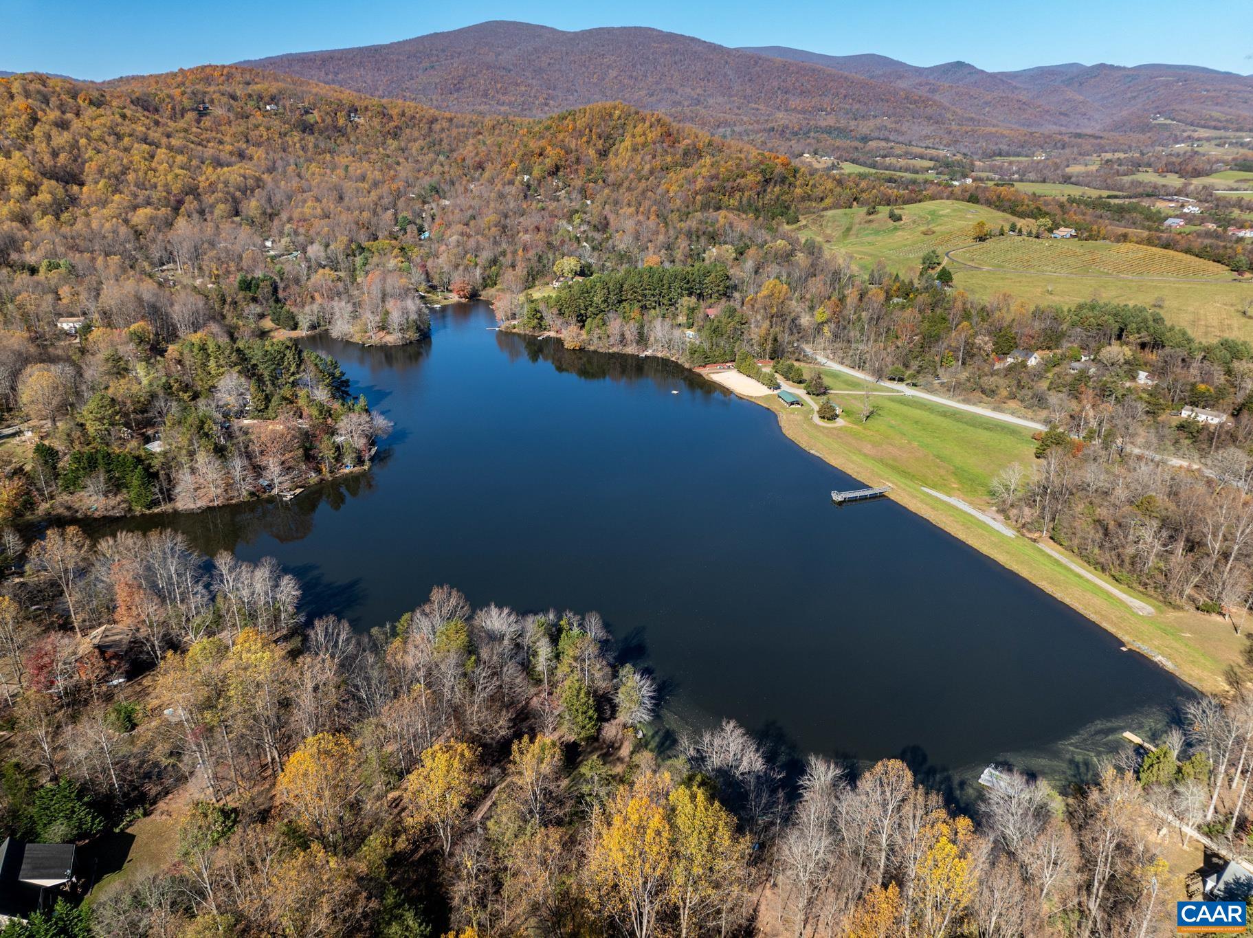 1022 Turkey Ridge Road Stanardsville, VA 22973 - Photo 64 of 74 a view of a lake with a mountain