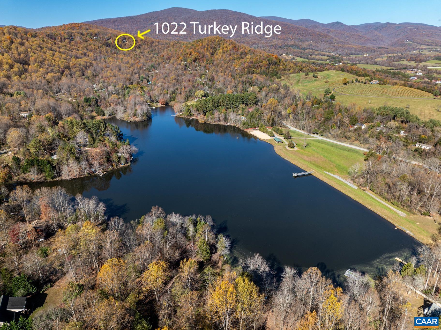 1022 Turkey Ridge Road Stanardsville, VA 22973 - Photo 65 of 74 a view of a lake with a mountain in the background
