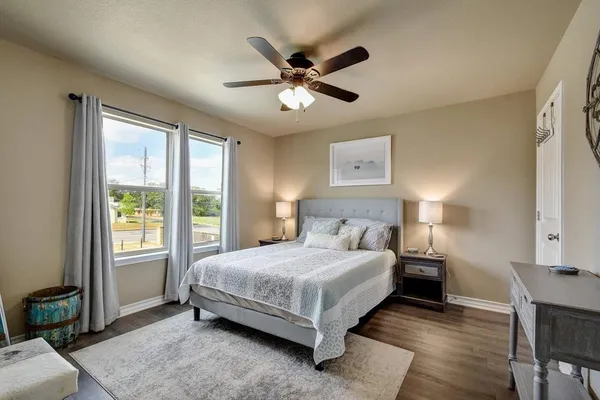 a sign that is on a brick wall