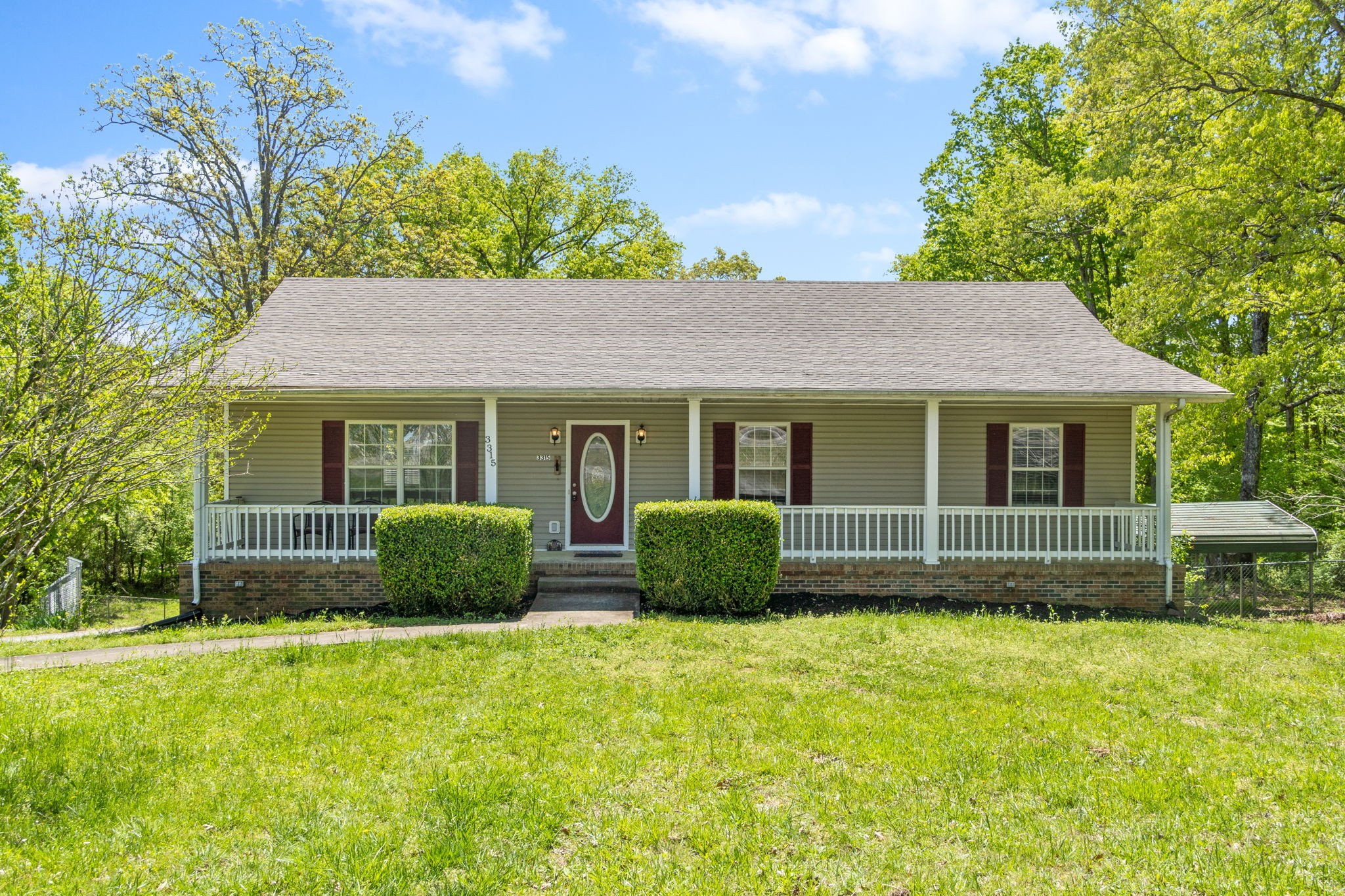 3315 Lylewood Road Woodlawn, TN 37191 - Photo 1 of 39 a view of a house with a garden
