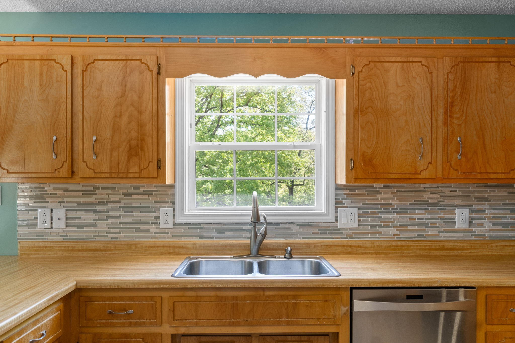 3315 Lylewood Road Woodlawn, TN 37191 - Photo 15 of 39 a kitchen with a sink and a window