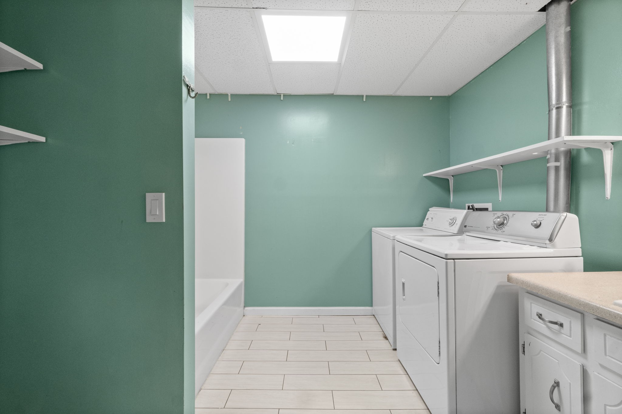 3315 Lylewood Road Woodlawn, TN 37191 - Photo 27 of 39 a utility room with dryer and washer