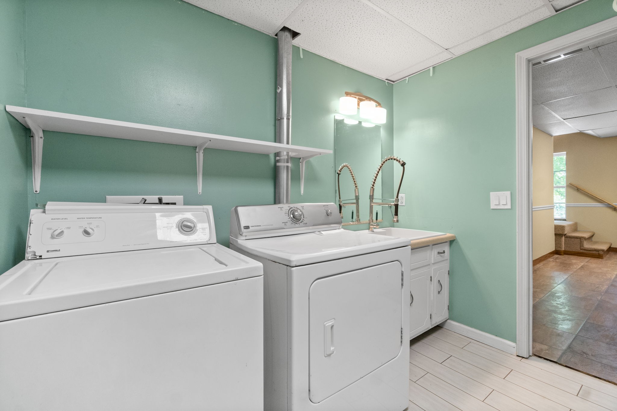 3315 Lylewood Road Woodlawn, TN 37191 - Photo 28 of 39 a utility room with dryer and washer