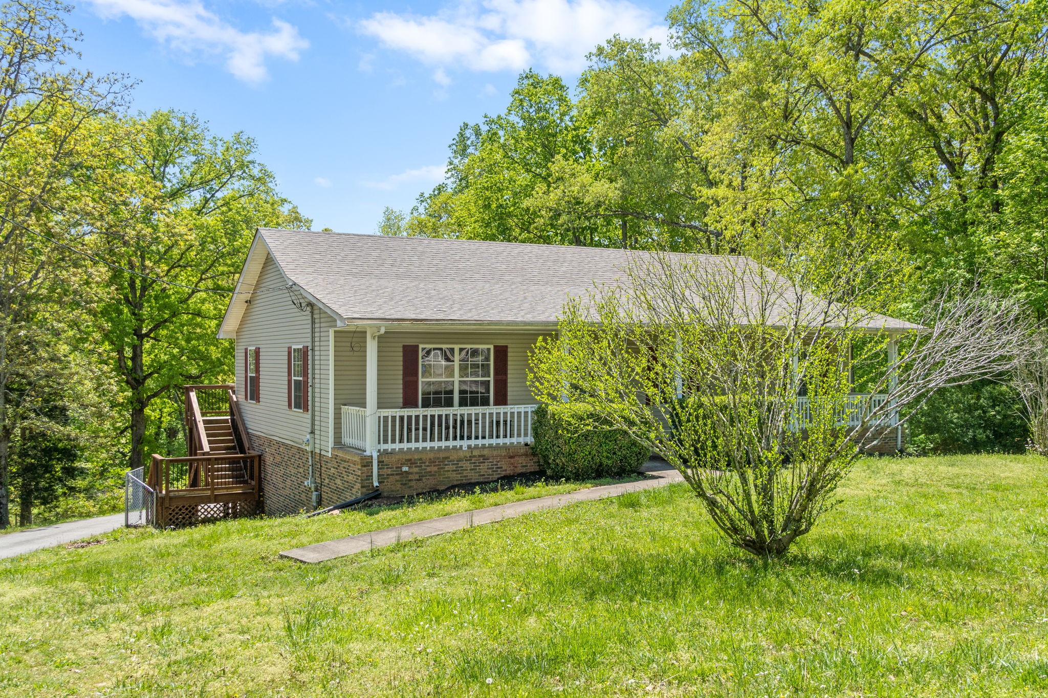 3315 Lylewood Road Woodlawn, TN 37191 - Photo 3 of 39 a view of a house with a backyard