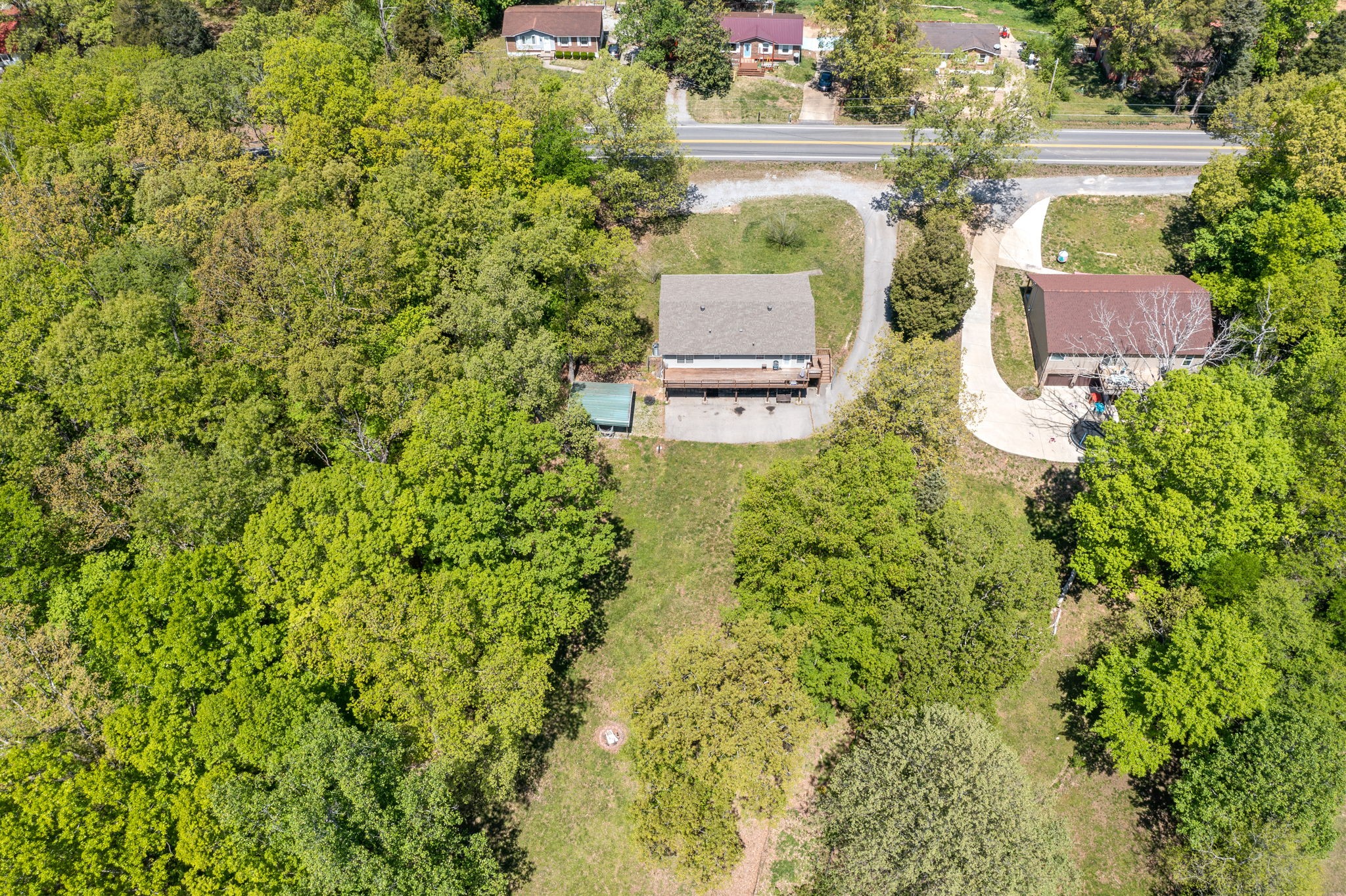 3315 Lylewood Road Woodlawn, TN 37191 - Photo 38 of 39 a view of a house with pool and garden