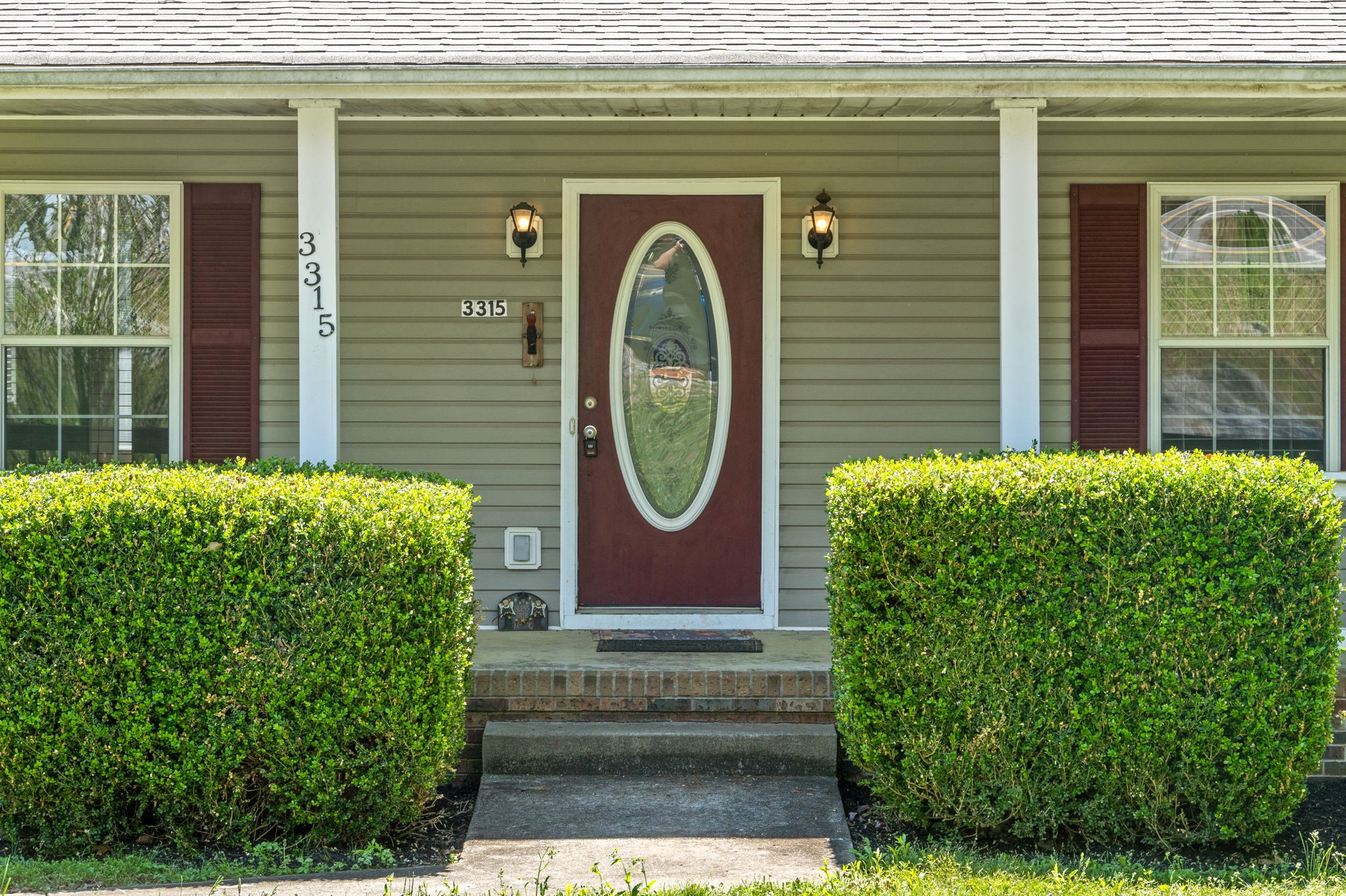 3315 Lylewood Road Woodlawn, TN 37191 - Photo 4 of 39 a front view of a house with garden