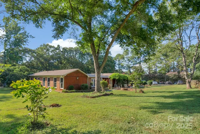a house with garden in front of it