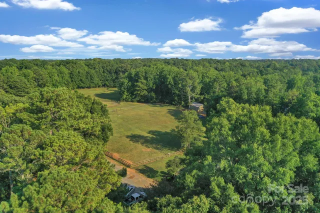 a view of a lake with a yard