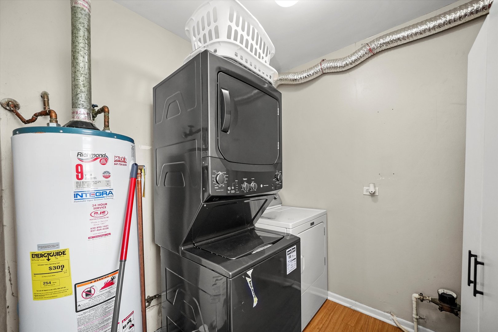 406 Cahill Road Streamwood, IL 60107 - Photo 15 of 22 a utility room with dryer and washer