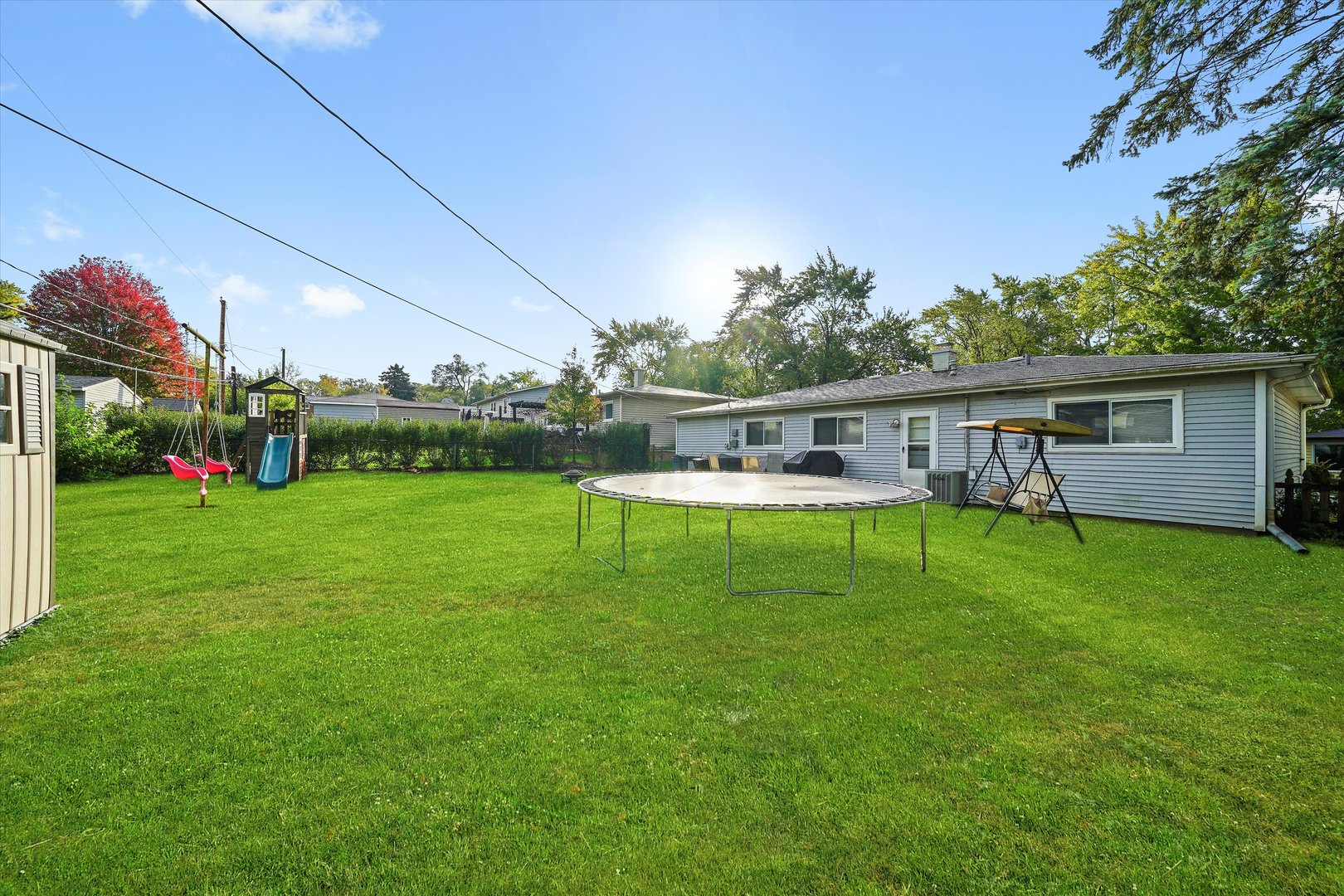 406 Cahill Road Streamwood, IL 60107 - Photo 18 of 22 a view of house with backyard