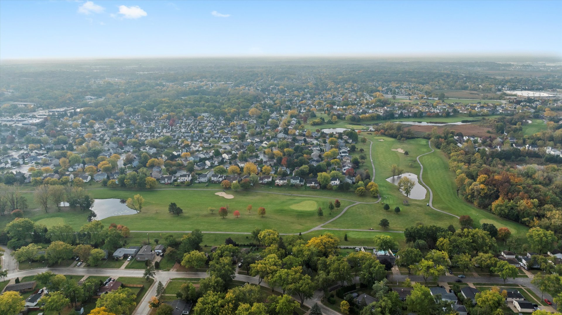 406 Cahill Road Streamwood, IL 60107 - Photo 21 of 22 an aerial view of a houses with outdoor space and lake view