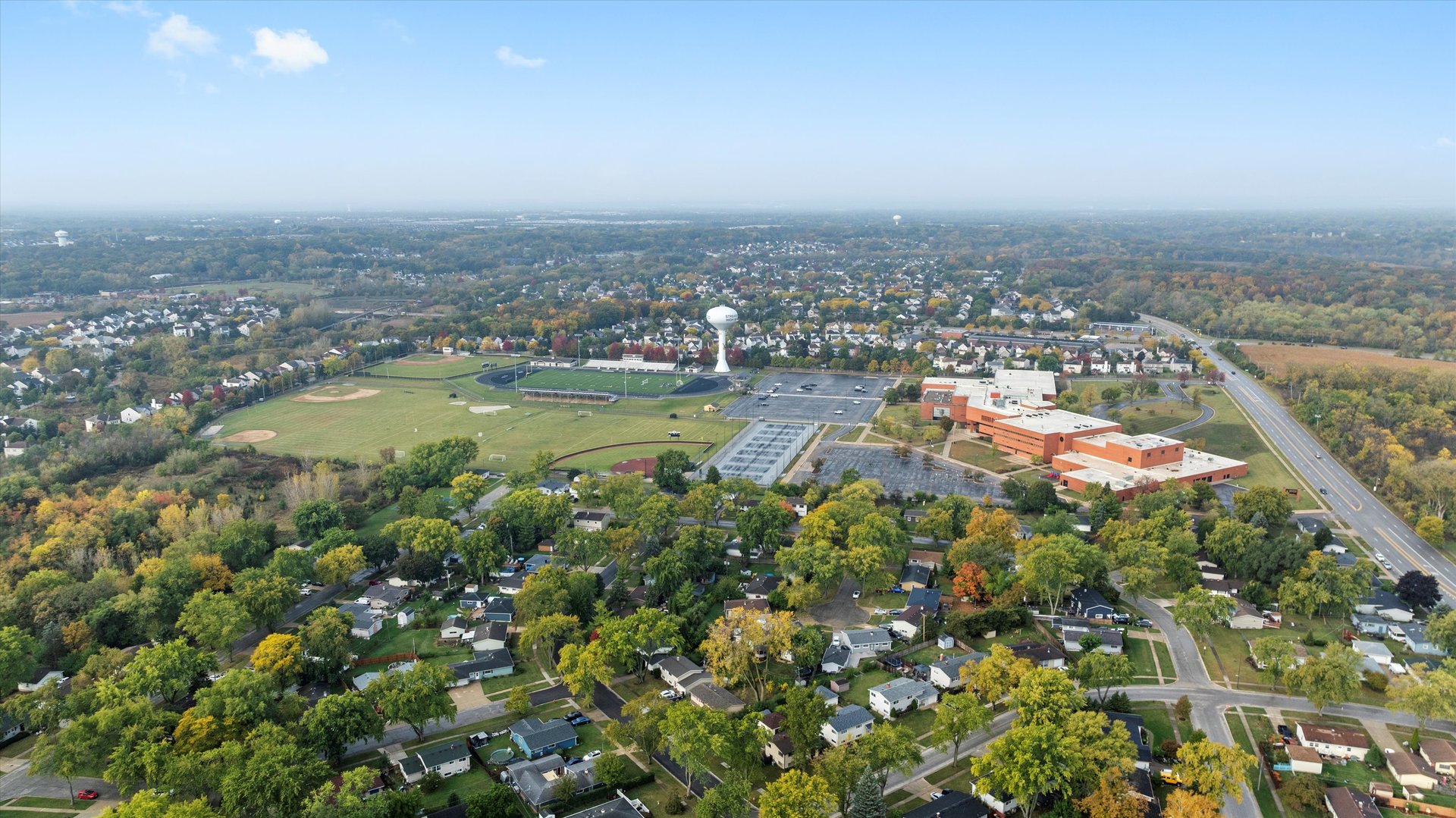 406 Cahill Road Streamwood, IL 60107 - Photo 22 of 22 an aerial view of residential houses with outdoor space and trees