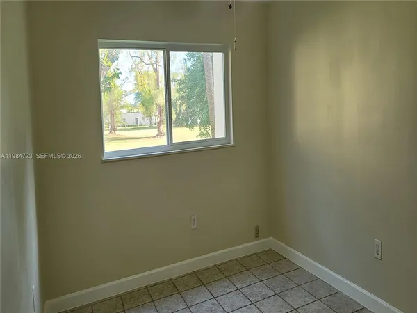 an empty room with a window