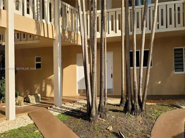 a view of a balcony with a patio