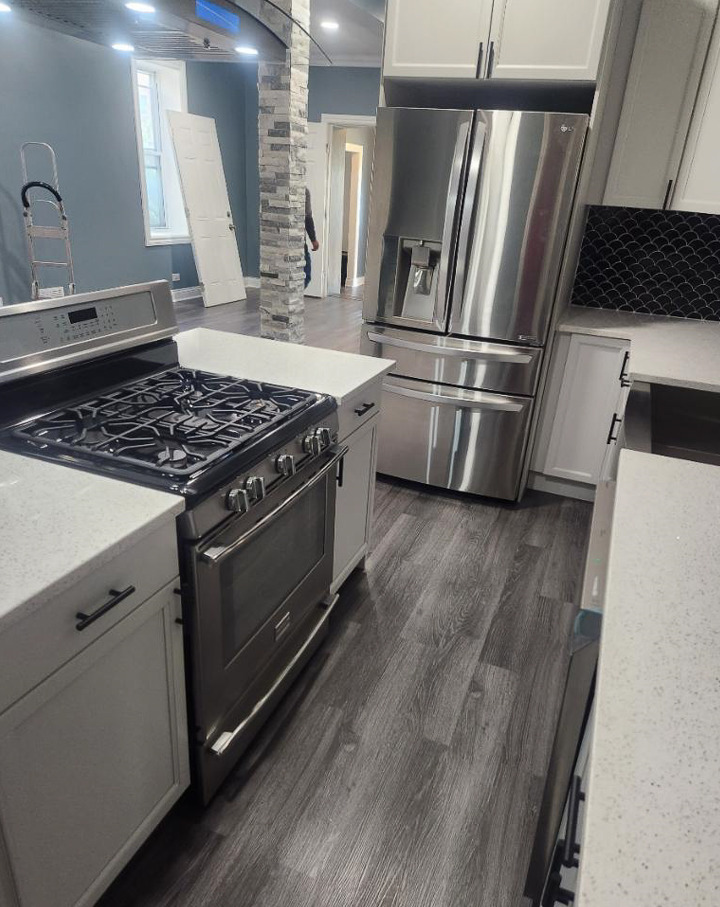 7046 South Wabash Avenue Chicago, IL 60637 - Photo 11 of 41 a kitchen with wooden floors and a stove