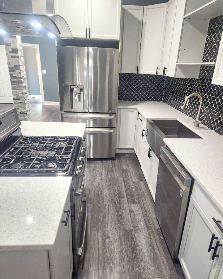 7046 South Wabash Avenue Chicago, IL 60637 - Photo 9 of 41 a kitchen with stainless steel appliances granite countertop a sink stove and refrigerator