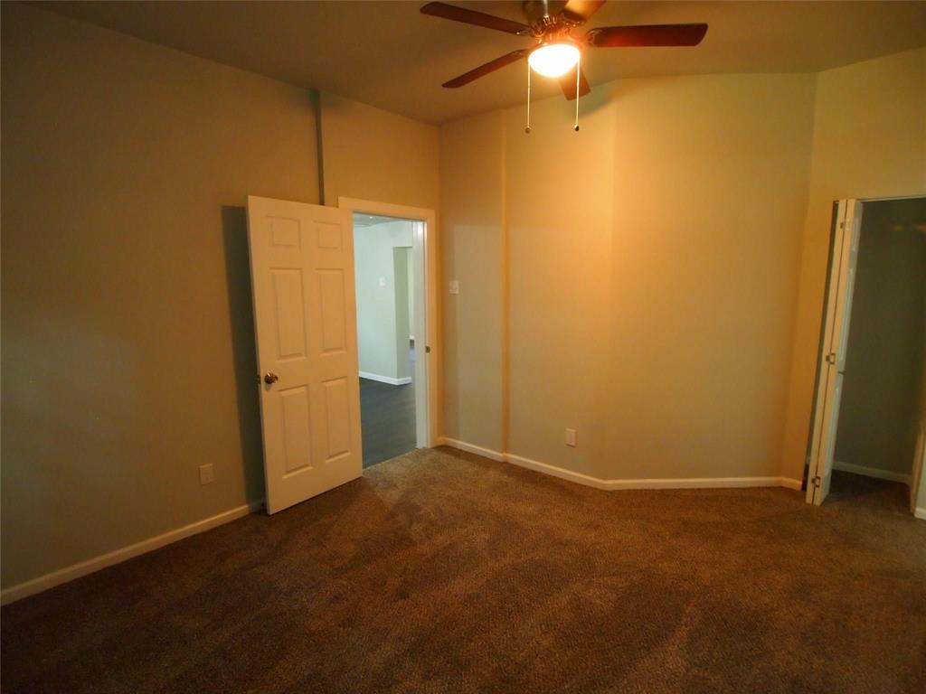 502 South Rusk Street Sherman, TX 75090 - Photo 11 of 15 a view of a livingroom with a chandelier fan