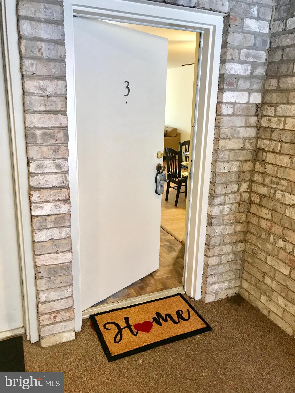 5570 Vantage Point Road, Unit 3 Columbia, MD 21044 - Photo 2 of 14 a view of a door and chair