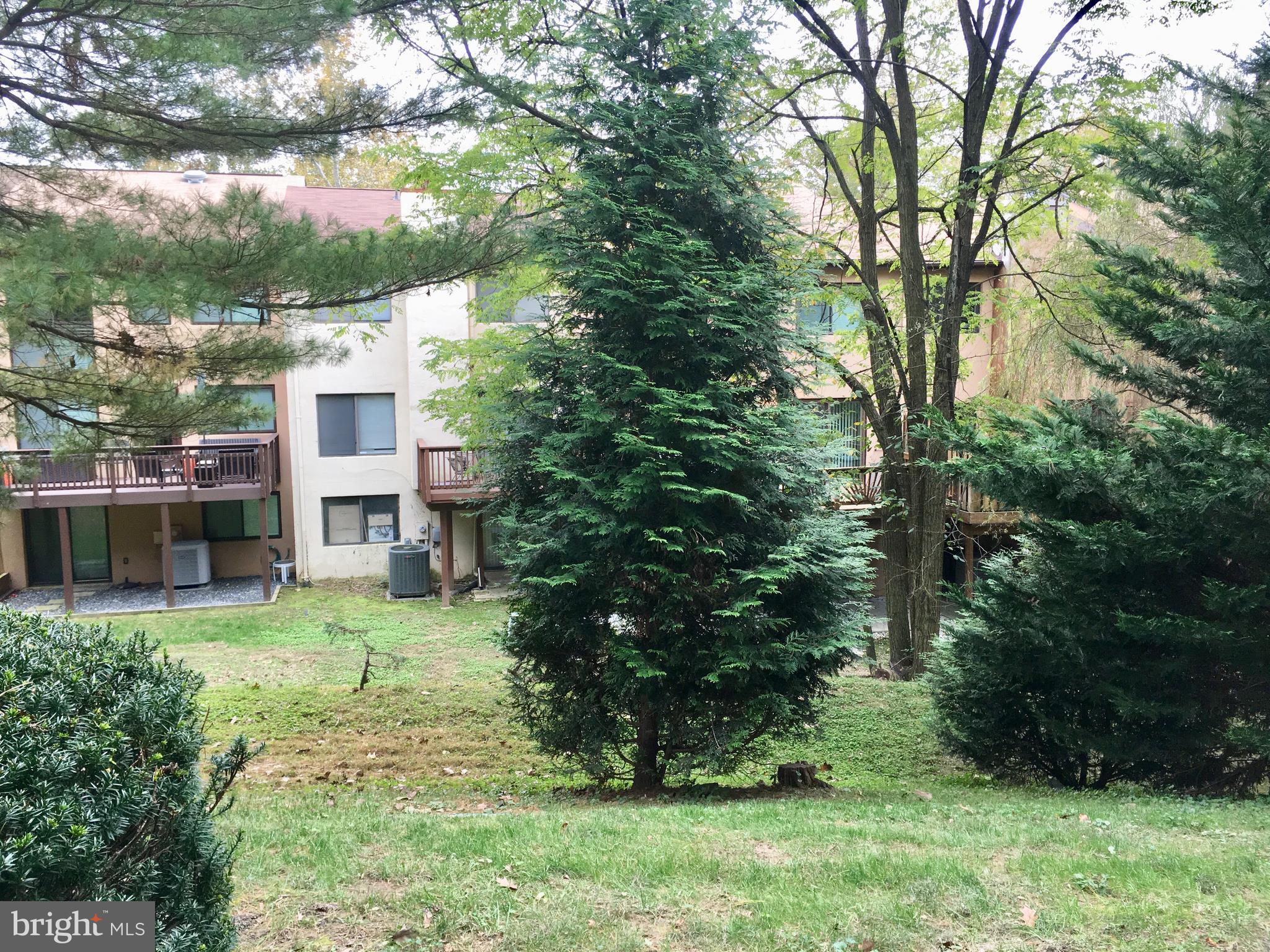 5570 Vantage Point Road, Unit 3 Columbia, MD 21044 - Photo 12 of 14 a view of a house with a yard