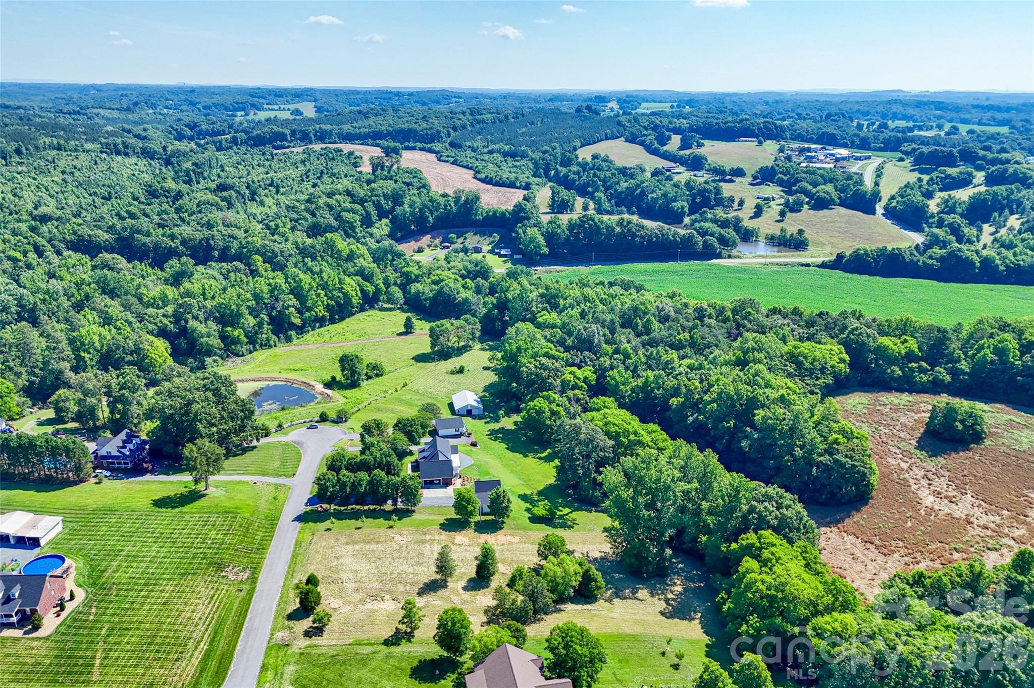 Lot 3 Crepts Branch Road, Unit 3 Locust, NC 28097 - Photo 24 of 36 an aerial view of a houses with a yard
