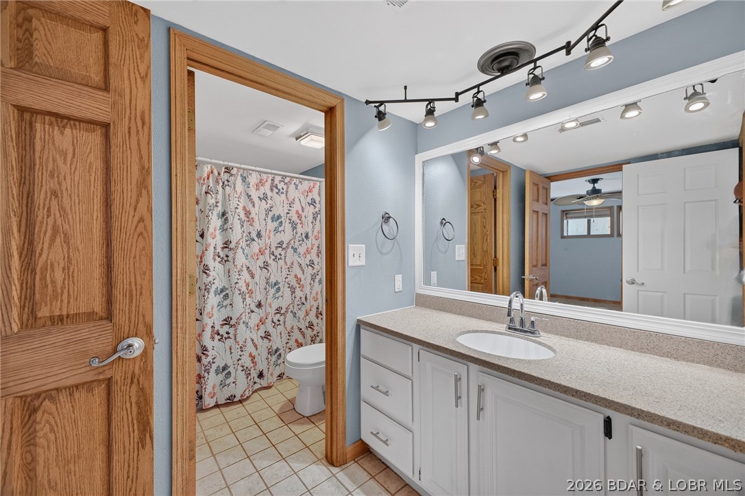 1111 Passover Road, Unit N1 Osage Beach, MO 65065 - Photo 41 of 57 Bath for primary and fancy lighting!