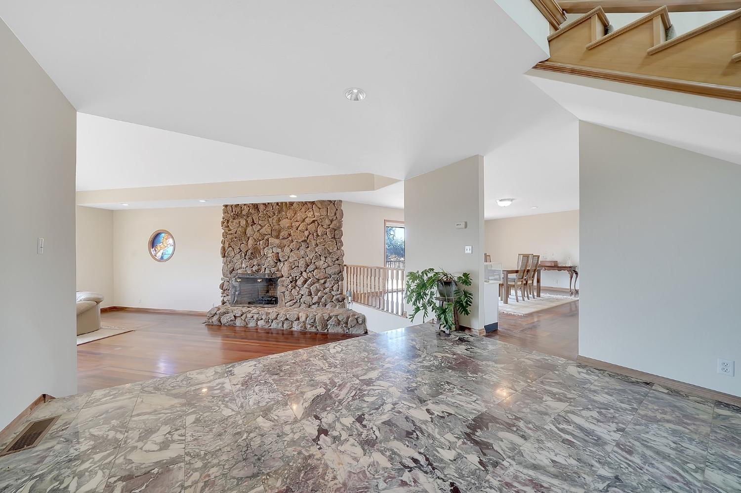 15111 Tyler Road Fiddletown, CA 95629 - Photo 12 of 92 a view of a livingroom with kitchen and couch