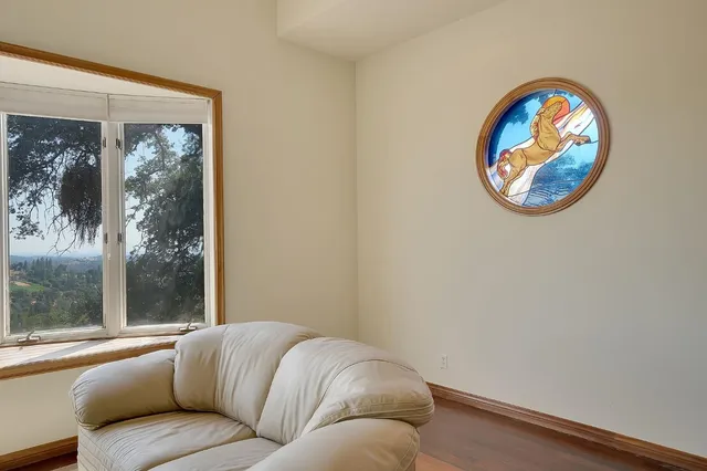 a kitchen with stainless steel appliances granite countertop a stove top oven a sink and a refrigerator