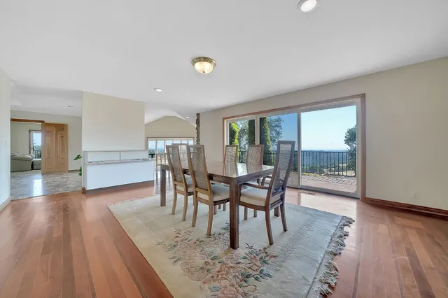 a backyard of a house with lots of green space