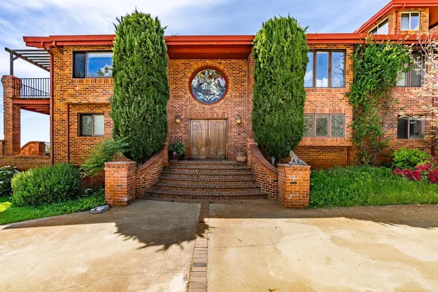 a view of backyard with green space