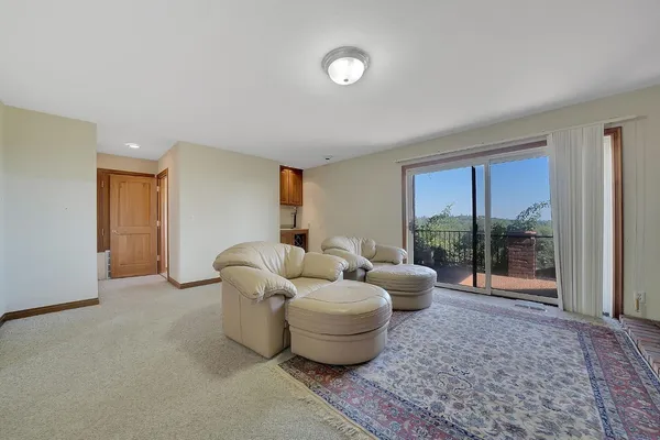 a view of a swimming pool from a balcony