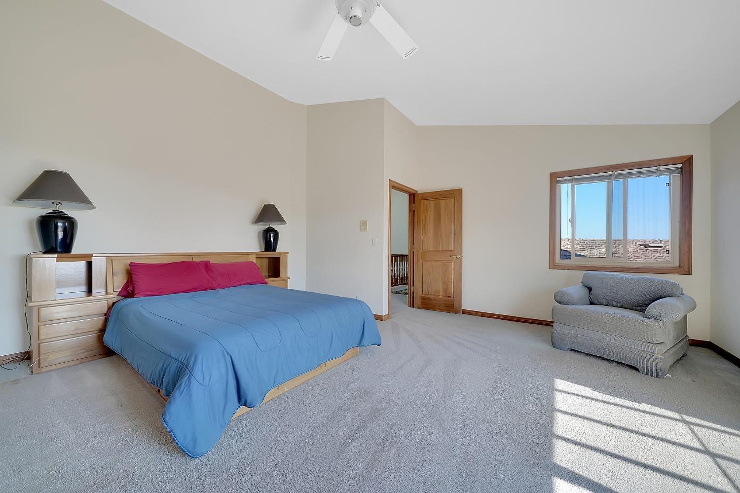 15111 Tyler Road Fiddletown, CA 95629 - Photo 41 of 92 a bedroom with a bed and a couch
