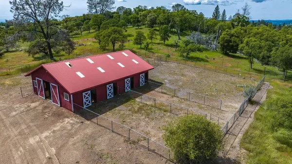 a view of a house with a door and wooden floor