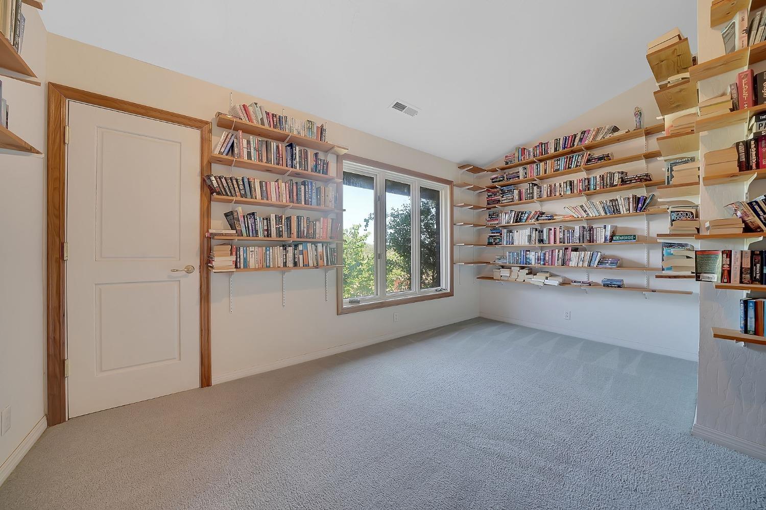 15111 Tyler Road Fiddletown, CA 95629 - Photo 52 of 92 a view of an empty room with a window