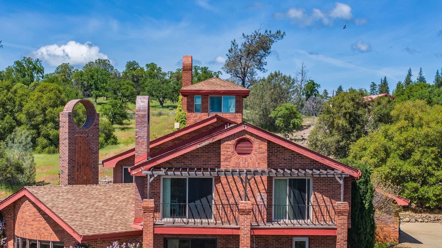 15111 Tyler Road Fiddletown, CA 95629 - Photo 63 of 92 a front view of a house with garden