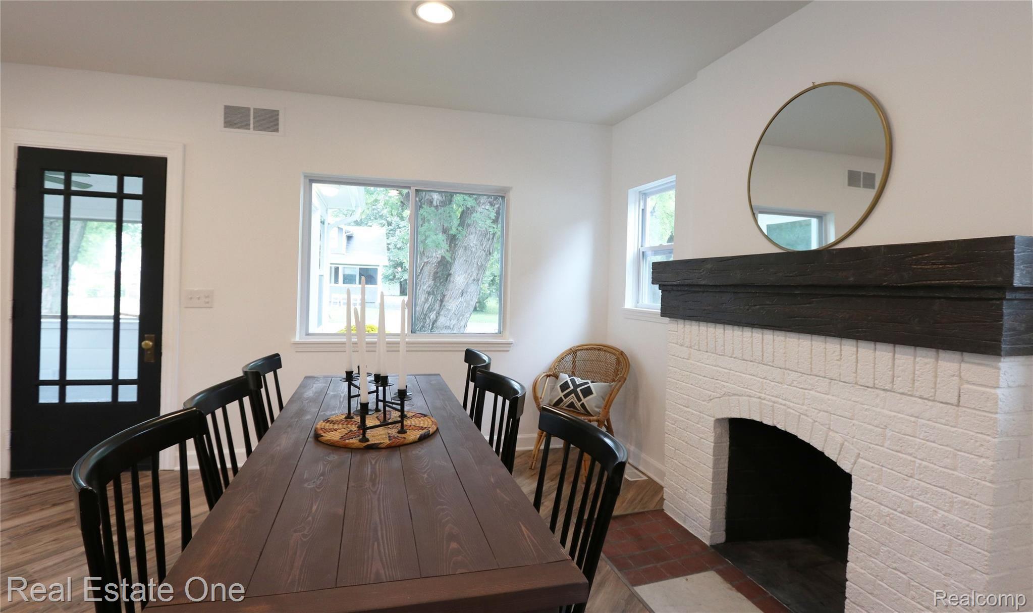 1809 Manse Road Waterford, MI 48328 - Photo 7 of 27 1809 Dining Fireplace.jpg