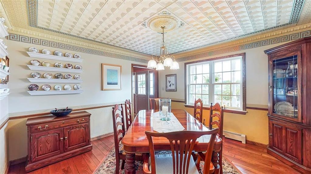 2163 Garards Fort Road Waynesburg, PA 15370 - Photo 13 of 25 a view of a dining room with furniture window and wooden floor