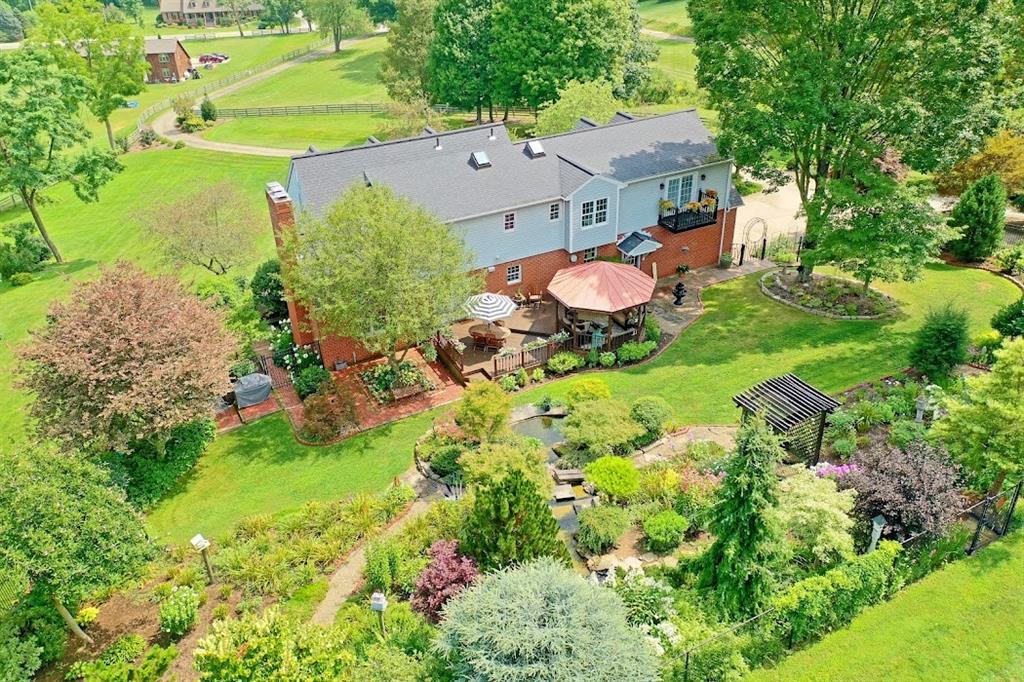 2163 Garards Fort Road Waynesburg, PA 15370 - Photo 3 of 25 an aerial view of residential house with an outdoor space and seating