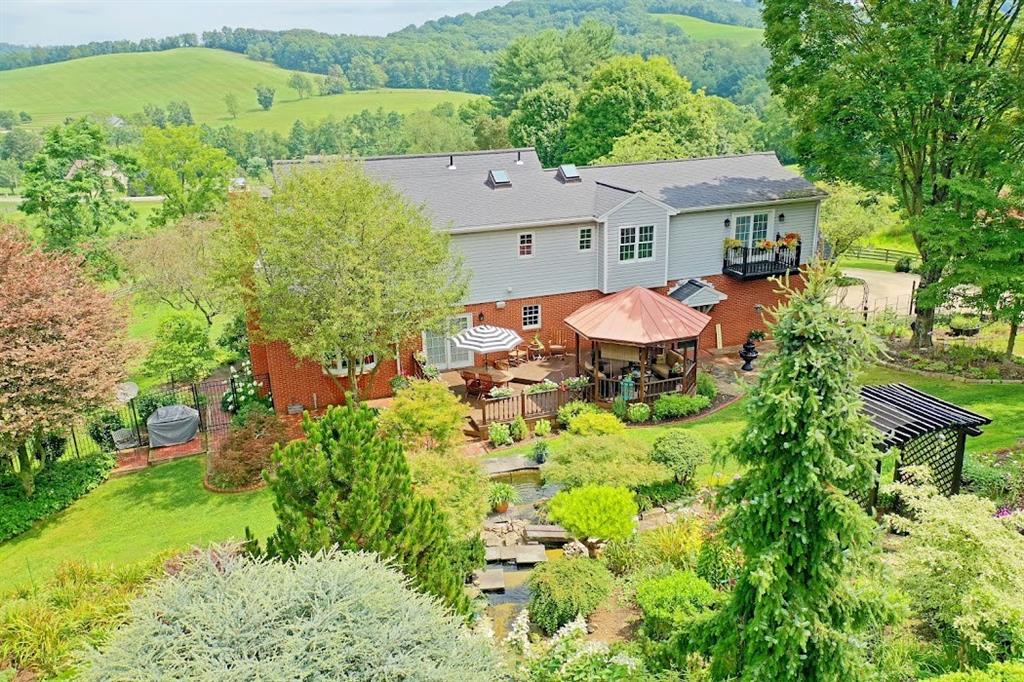 2163 Garards Fort Road Waynesburg, PA 15370 - Photo 4 of 25 an aerial view of a house with a garden