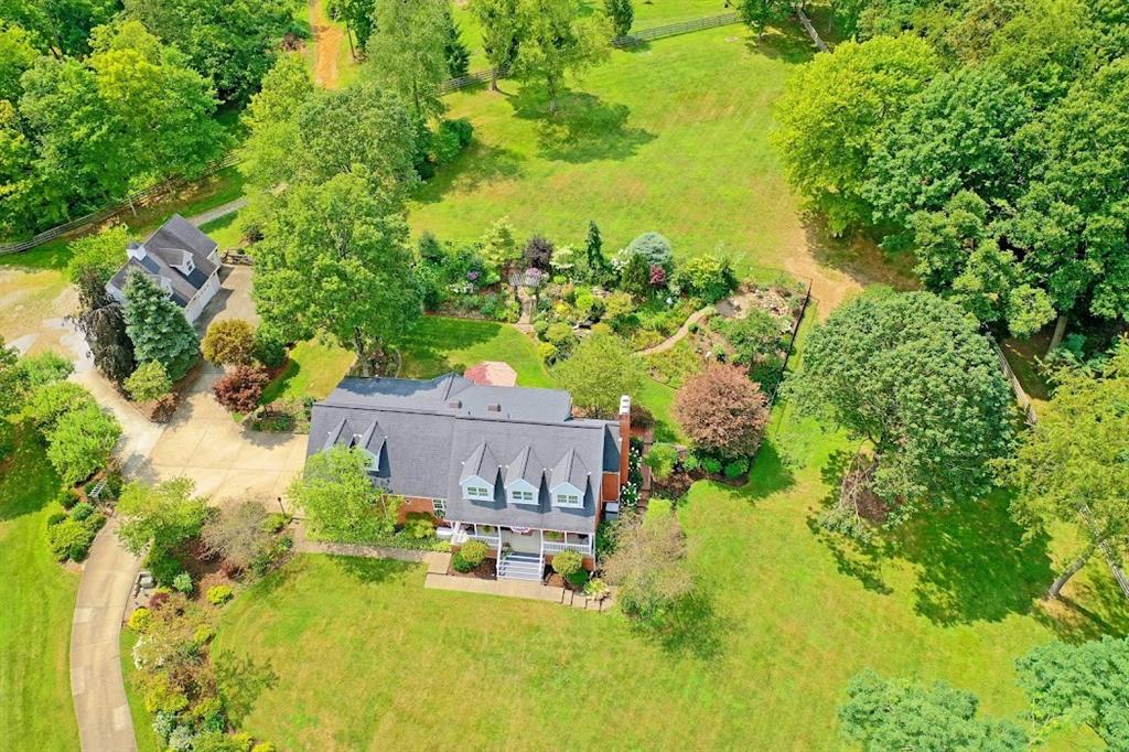 2163 Garards Fort Road Waynesburg, PA 15370 - Photo 7 of 25 an aerial view of a house with a yard lake house and tree in the background