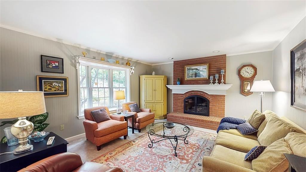 2163 Garards Fort Road Waynesburg, PA 15370 - Photo 10 of 25 a living room with furniture and a fireplace