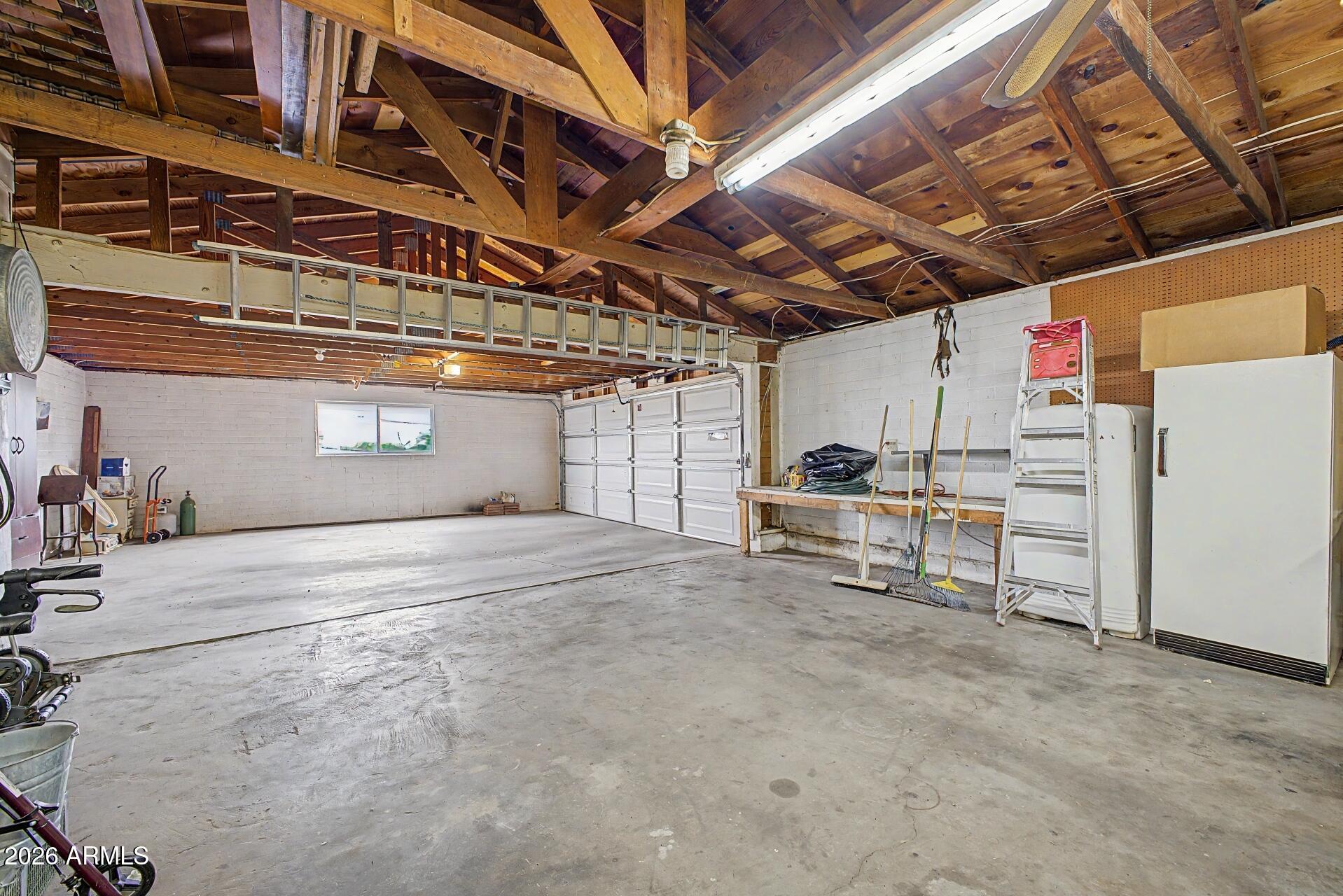 1702 East Griswold Road Phoenix, AZ 85020 - Photo 26 of 38 a view of a storage room with racks on the wall