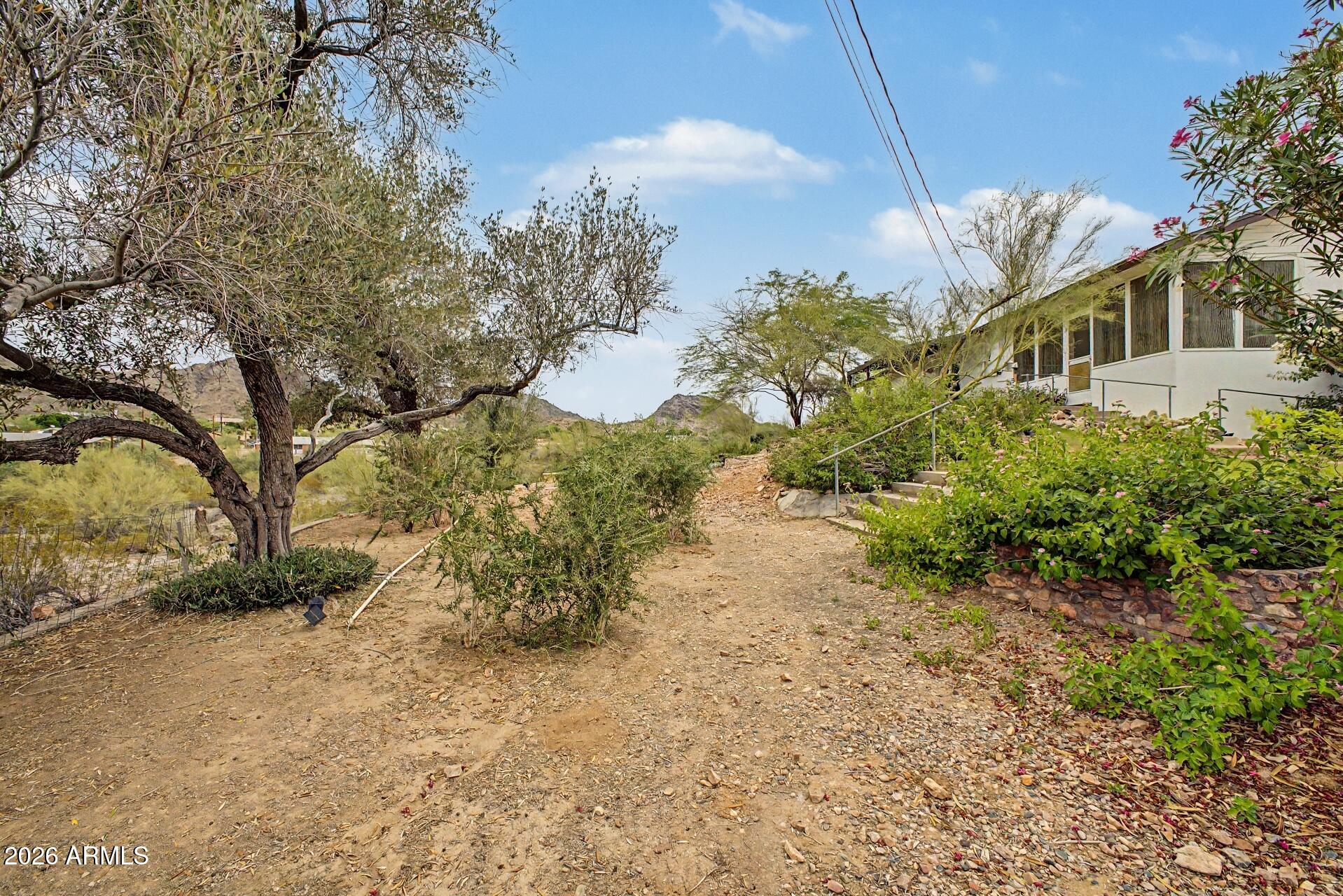 1702 East Griswold Road Phoenix, AZ 85020 - Photo 36 of 38 a view of a house with a yard