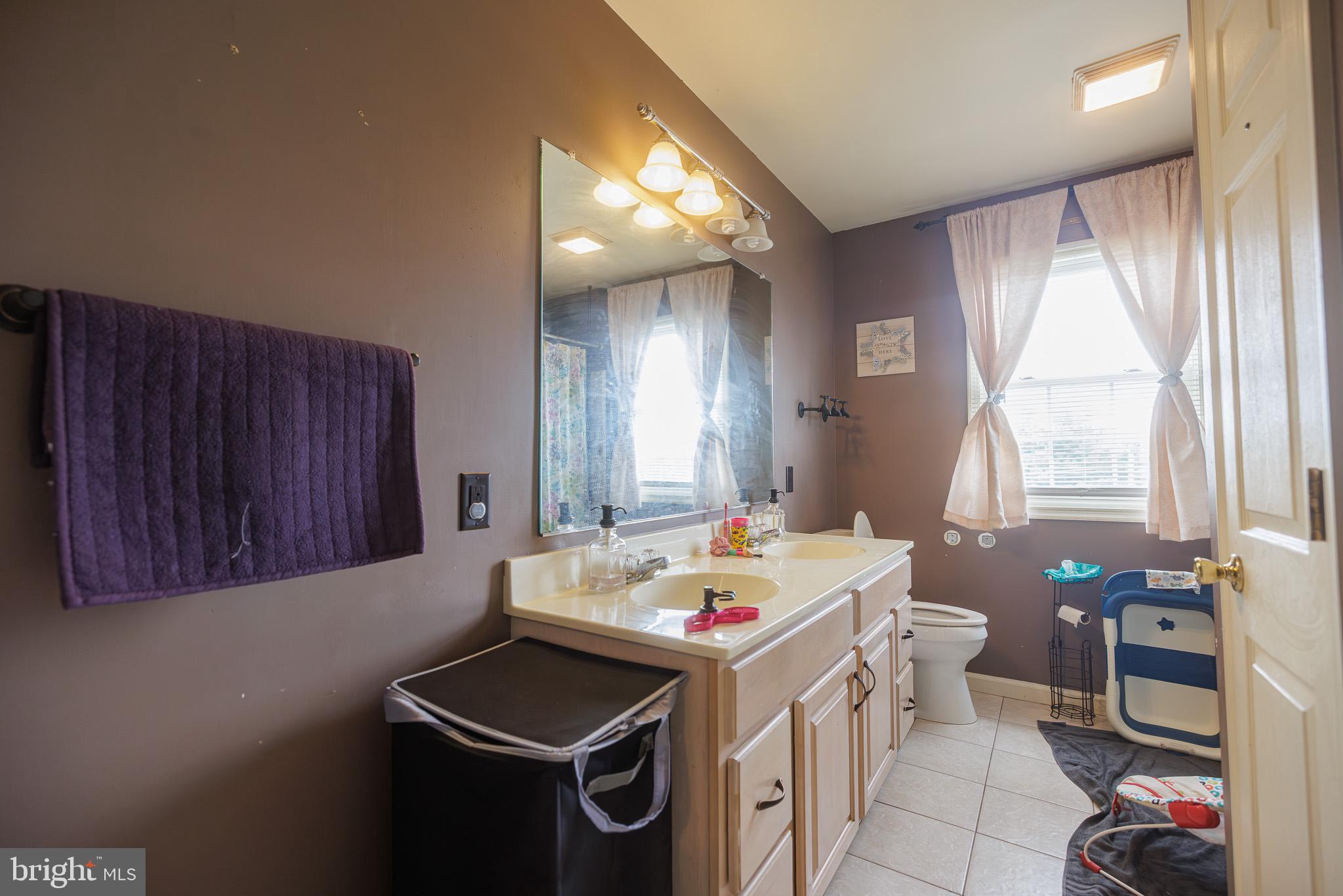 3022 Oak Drive Sinking Spring, PA 19608 - Photo 18 of 28 a kitchen that has a sink and a stove in it